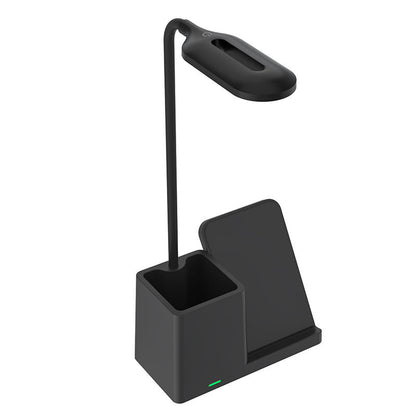 WhirlBD 15W wireless charger with pen holder and desk lamp, shown on a modern workspace with iPhone charging.