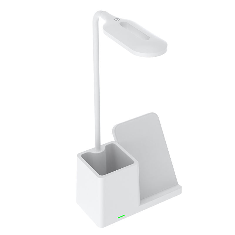 WhirlBD 15W wireless charger with pen holder and desk lamp for iPhone, showing the sleek charging pad and integrated lamp on a desk.