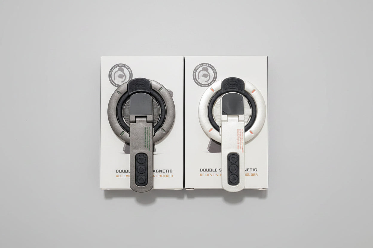 WhirlBD double-sided magnetic phone holder mounted on a car dashboard and desk, holding a smartphone securely.