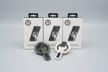WhirlBD double-sided magnetic phone holder mounted on a car dashboard, holding a smartphone securely for easy viewing.