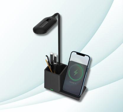 WhirlBD 15W wireless charger with integrated pen holder and desk lamp, compatible with iPhone and other Qi-enabled devices.